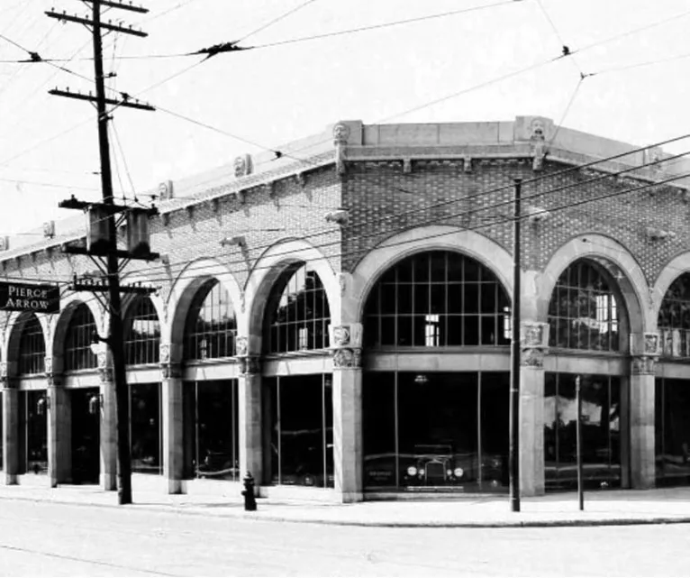 Archival photograph of the arched Pierce-Arrow showroom at Yonge and Marlborough