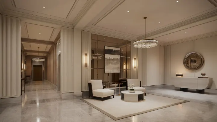 Elevator lobby with a chandelier and lounge chairs