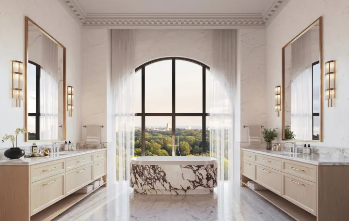 Marble ensuite with a freestanding tub under an arched window