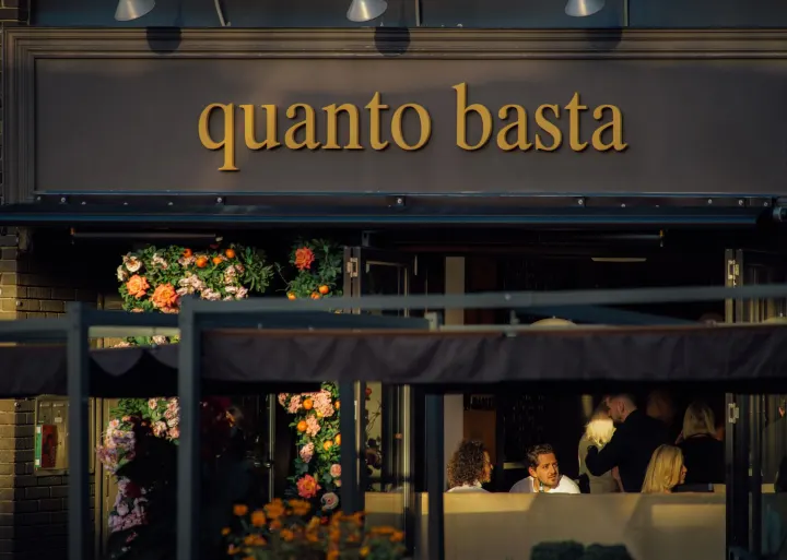 Quanto Basta restaurant at night